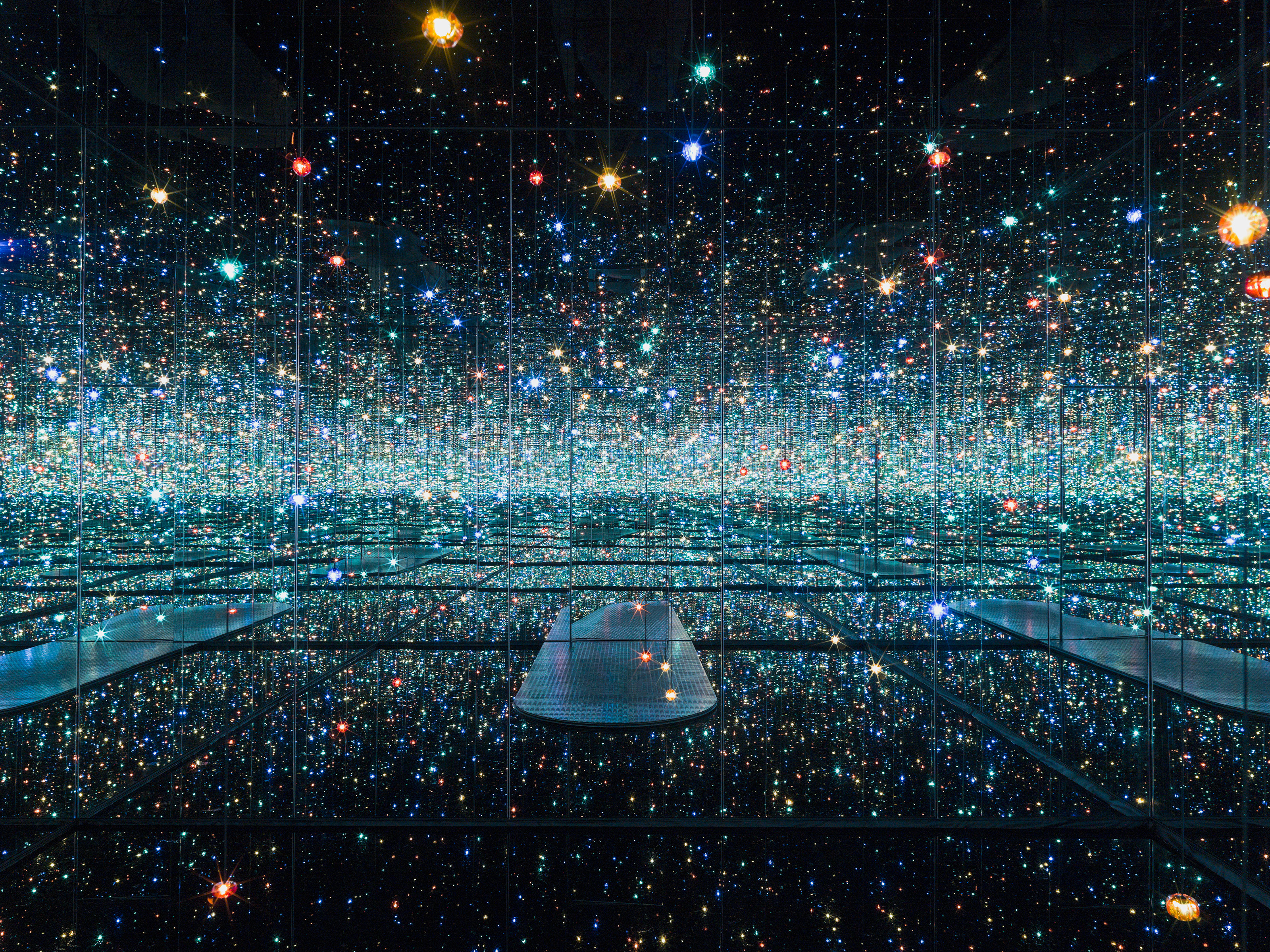 The meme is an image of a dark room filled with a vast, starry expanse. The text "I'm not crying, I'm just allergic to happiness" appears at the top of the image, adding a touch of humor to the already emotional scene.
